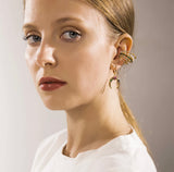 The multiple pearls and shine Earcuffs