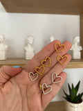 The “tiny hearts” studs - gold or silver